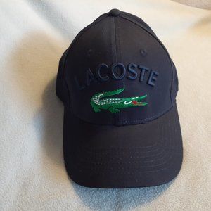 Lacoste one size fits all, with adjustable strap on the back, Navy blue